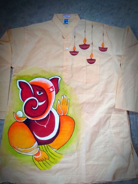 Fabric printing of ganesh and diya on cotton Panjabi. Fabric Penting Blouse, Ganesh Fabric Painting, Ganpati Fabric Painting, Kurta Fabric Painting, Febric Penting Design Panjabi, Panjabi Fabric Painting, Ganesh Craft, Punjabi Art, Embroidery Shirt Men