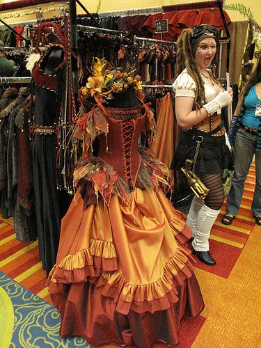 autumn dress + dreads | Flickr - Photo Sharing! Orange Ren Faire Outfit, Leannan Sidhe, Fire Fairy Outfit, Renfaire Outfit Ideas, Autumn Gown, Eladrin Dnd, Fall Fairy Costume, Dryad Costume, Steampunk Dresses