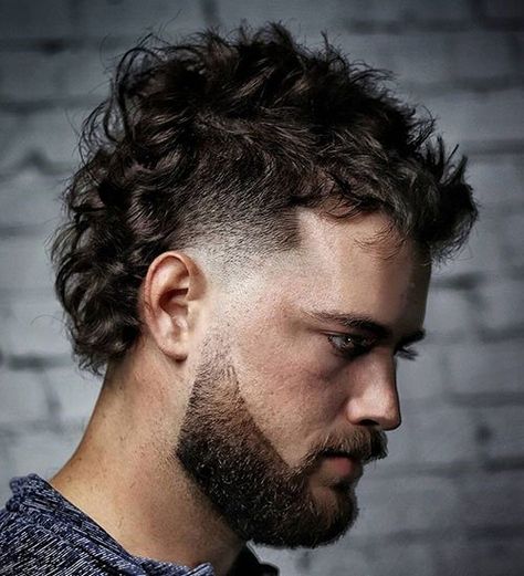 57 Cool Mullet Haircuts For Men (2022 Style Guide) Stylish Mullet Haircut Men, Tyler Fashion, Modern Mullet Haircut, Husband Hair, Curly Mohawk Hairstyles, Mullet Fade, Mohawk Mullet, Mohawk Hairstyles Men, Curly Mohawk