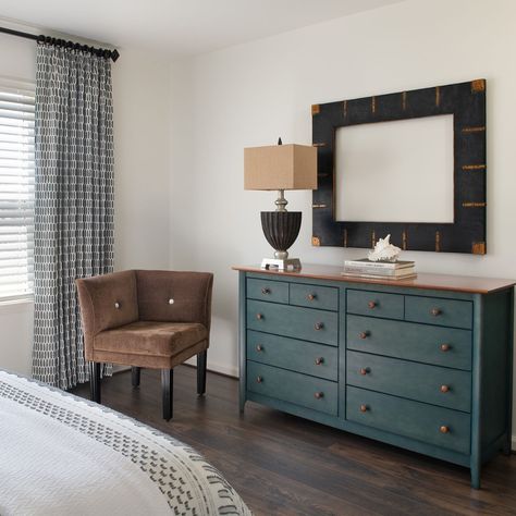 This beautiful bedroom just needed a few accent pieces to make it feel complete. The large dresser in a teal green color adds plenty of storage space while also bringing a fun pop of color into the room! The crisp draperies and comfortable seating give this look a put-together feel. #KnoxvilleInteriorDesigner #InteriorDesign #HomeDecor #BedroomDesign Dark Teal Dresser, Teal Dresser, Large Dresser, Teal Green Color, Beautiful Bedroom, Beautiful Bedrooms, Dark Teal, Teal Green, Comfortable Seating