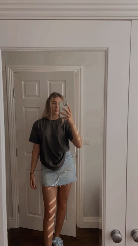 T Shirt And Jean Skirt Outfit, Jean Shorts Baggy Shirt, Skirt With Baggy Shirt, Mini Skirt With Oversized Shirt, Big T Shirt Mini Skirt, Skirt And Baggy Shirt, Short Denim Skirt Outfits Aesthetic, Oversized Tshirt Mini Skirt, Oversized Top Outfit