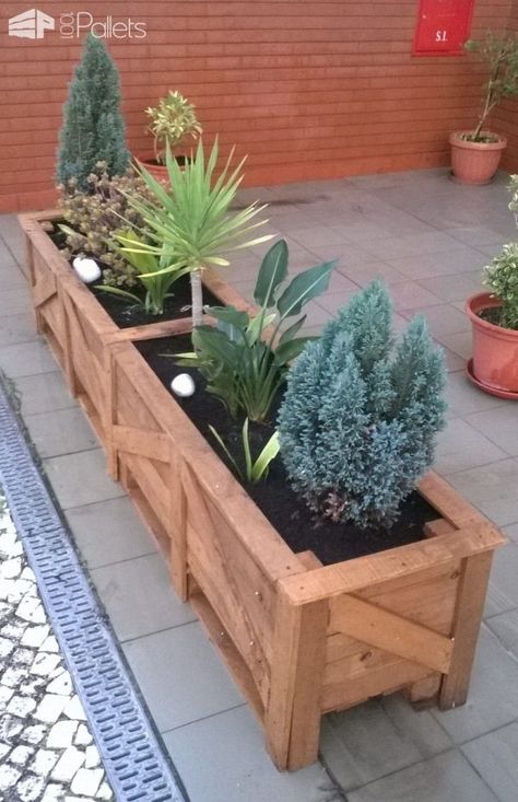 #Garden, #Outdoors, #PalletPlanter, #PalletPlanterBox, #Patio, #RecyclingWoodPallets The neighbors and I wanted to dress up the front of the building and make a more pleasant patio area. We got together and made this set of Patio Pallet Planters from 20 pallets. We completed this project in about 20 hours or so. Patio Pallet Pallet Planters, Euro Pallet, Pallet Planter Box, Small Patio Decor, Diy Garden Patio, Wooden Planter, Pallet Planter, Patio Planters, Pallet Garden