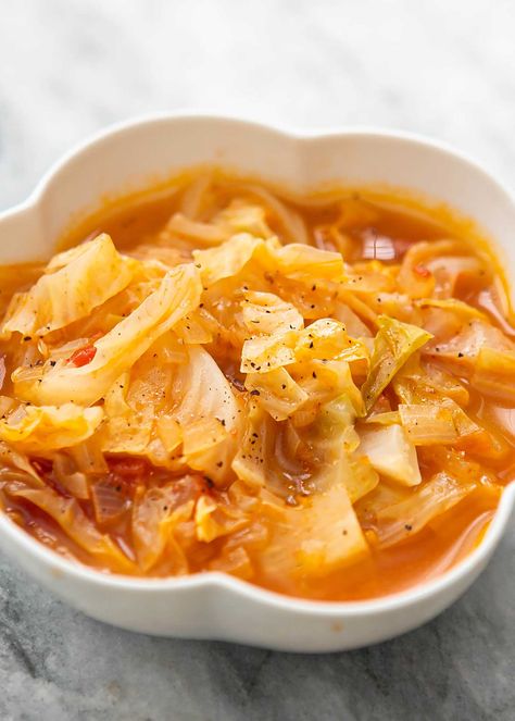 Here's an easy, nourishing cabbage soup for cold winter days. Made with just a handful of ingredients and ready in under an hour, the soup is simplicity at its best. #cabbage #cabbagerecipes #cabbagesoup #easysoup #souprecipes #soups #simplyrecipes Csid Diet, Sopas Light, Nourishing Soup, Cabbage Chicken, Easy Cabbage Soup, Cabbage Soup Recipe, Cabbage Stew, Small Cabbage, Veg Soup