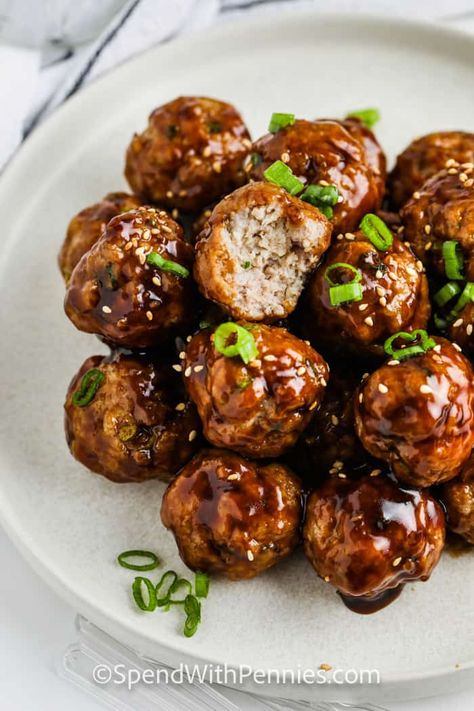 Hoisin Meatballs are an easy favorite appetizer. Tender pork meatballs are tossed in a sweet and sticky sauce. #spendwithpennies #hoisinmeatballs #recipe #meatballs #hoisin #asian #glaze #sauce #appetizer #best #juicy Hoisin Meatballs Recipe, Asian Meatballs Crockpot, Spicy Asian Meatballs, Hoisin Meatballs, Frozen Meatballs Crockpot, Asian Glaze, Tender Meatballs, Glazed Meatballs, Meatball Sauce