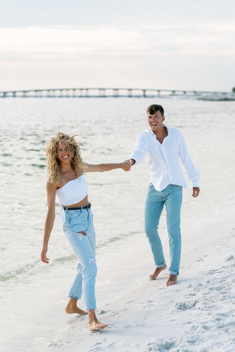 Looking for beach engagement photo session inspiration? We got you! Kaitlyn and Joe's session from this past April is one of my favorites of all time. We love the casual jeans and white top coordinating first look! This secluded beach in Destin, FL was the perfect location for a sunset photoshoot. Jeans And White Top, Beach Snap, Boat Engagement Photos, Prenup Outfit, Beach Photoshoot Family, Engagement Photo Shoot Beach, Boat Engagement, Beach Picture Outfits, White Tee Jeans