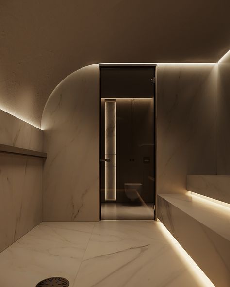 The centerpiece of our spa zone is the hammam, where we’ve thoughtfully incorporated hidden lighting to accentuate its curved forms and highlight the architectural nuances of the design. This subtle illumination not only enhances the serene ambiance but also showcases the meticulous attention to detail that defines the space. ✨💆‍♂️ Design by #artpartnerarchitects #SpaDesign #LuxuryWellness #ArchitecturalElegance #InteriorLighting #CuratedSpaces Dark Spa Interior, Spa Bathroom Black, Dark Spa Aesthetic, Bathroom Dark Marble, Fancy Bathroom Luxury Dark, Spa Area, Modern Spa, Hidden Lighting, Dark Modern