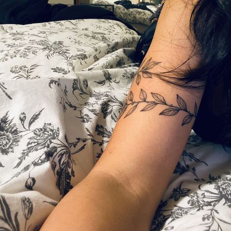 Upper Arm Tattoos For Women Wrap Around, Wrap Around Mid Arm Tattoo, Upper Arm Woman Tattoo, Vine Wrap Around Tattoo Upper Arm, Ivy Arm Band Tattoo, Upper Arm Leaves Tattoo, Tattoo Ideas Around Arm, Cuff Tattoo Upper Arm, Foliage Arm Tattoo