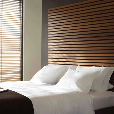 Minimalist wood slat wall headboard Horizontal Wood Slat Wall Bedroom, Slat Board Headboard, Wall Panel Headboard Ideas, Diy Wall Mounted Headboard, Slat Wall Headboard, Diy Wood Slat Wall, Slat Wall Ideas, Wall Headboard Ideas, Bedroom 2025