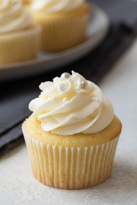 Tender vanilla cupcakes topped with vanilla buttercream frosting. This homemade vanilla cupcake recipe is suitable for any occasion. Best Vanilla Cupcakes, Best Vanilla Cupcake Recipe, Homemade Vanilla Cupcakes, Moist Vanilla Cupcakes, Pudding Cupcakes, Vanilla Cupcake Recipe, Homemade Cupcakes, Vanilla Buttercream Frosting, Vanilla Cake Recipe