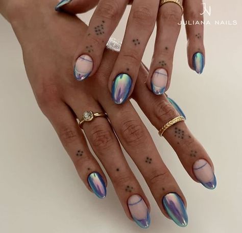 Chrome light blue nail color and French tips on medium round nails