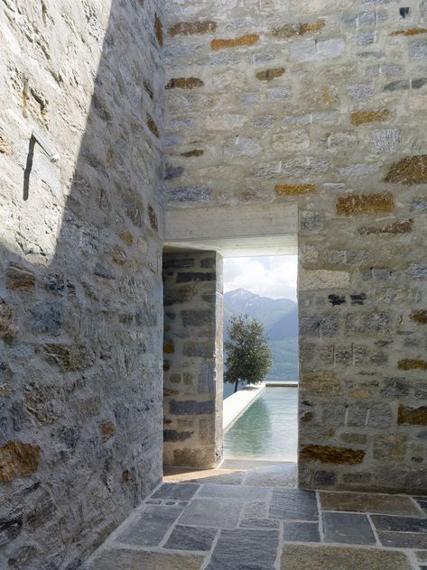 Through the opening and straight into the pool! Another great space.  Brione House / Wespi de Meuron Stone Building, Stone Architecture, Stone Houses, Brick And Stone, Stone House, Architecture Photography, Modern Architecture, Contemporary House, Architecture House