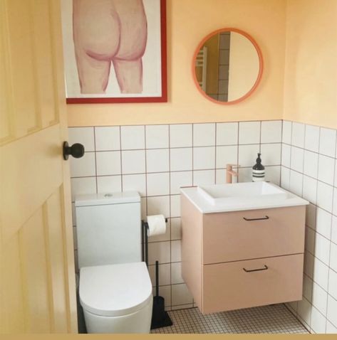 Best Colours For Bathroom, Peach And White Bathroom, Peach Colour Bathroom, Yellow Tiled Bathrooms, Bathroom Pop Of Color, Small Colourful Bathroom, Peach Toilet, Tile Paint Bathroom, Colorblock Bathroom