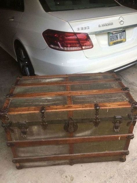 My mother gave me my Great Grandmother's steamer trunk, which is about 120 years old. I wanted to just spruce it up and get rid of the musty smell. Mission accomplished! The trunk is covered in canvas which I lightly sanded in places where paint had been splattered on it. Both the drawer and the trunk itself were lined with paper. This is what was holding the musty smell. I used a mixture of white vinegar and water to spray the paper. Let it sit and then scraped it off. It was a… Steamer Trunk Makeover, Trunk Redo, Antique Trunk Restoration, Trunk Restoration, Lowes Paint, Trunk Makeover, Vintage Steamer Trunk, Cardboard Suitcase, Antique Trunks