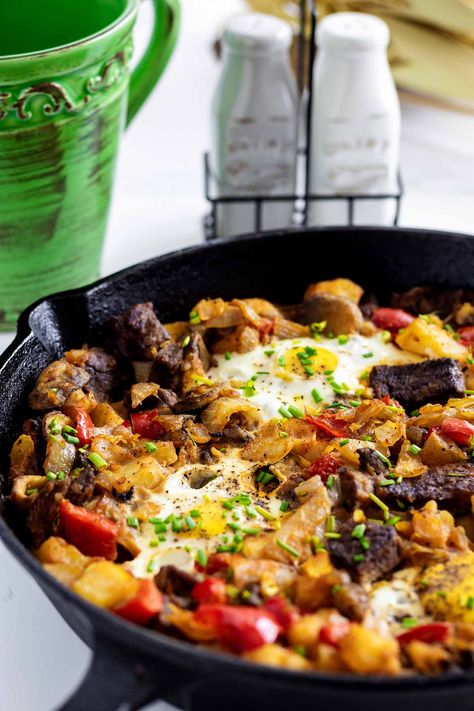 Our healthy steak and eggs hash is the perfect hearty meal for breakfast or brunch. It's a great way to use leftovers or make it fresh for a great weekend breakfast meal. Get the easy step-by-step instructions with photos at Heavenly Home Cooking. Steak And Eggs Breakfast, Hash Recipes, Leftover Steak Recipes, Breakfast Feast, Healthy Steak, Supper Tonight, Steak Breakfast, Leftover Steak, Dough Starter