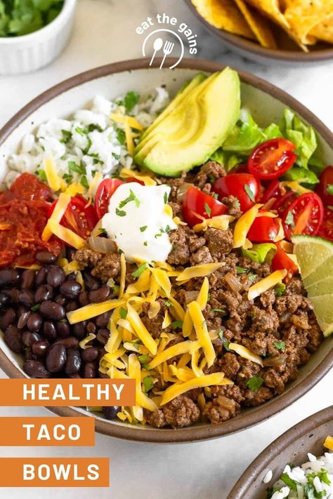 A quick and easy dinner, these taco bowls never disappoint. Made with ground beef taco meat, cilantro lime rice, black beans, and all your favorite taco fixings, they are packed with protein and fiber and are so delicious! Gluten-free and easily made dairy-free. Ground Beef Taco Bowls, Beef Taco Bowls, Dairy Free Tacos, Ground Beef Taco Meat, Taco Fixings, Beef Taco Meat, Taco Bowl Recipe, Rice Black Beans, Ground Beef Taco