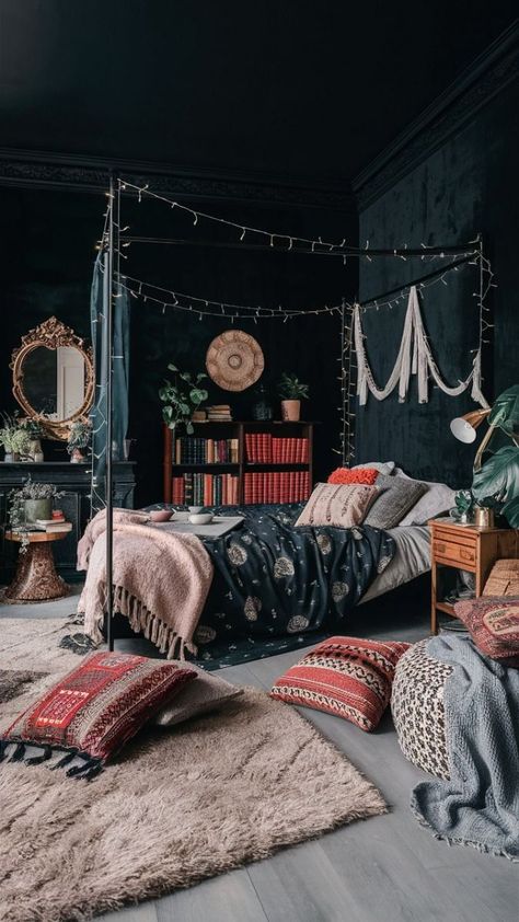 A cozy and stylish black boho-style bedroom, with an eclectic mix of furniture and decor. The room features a canopy bed adorned with a boho-chic print, surrounded by soft fairy lights. A plush area rug lays out on the floor, with a mix of colorful pillows and throw blankets. A wooden bookshelf with a collection of books and plants stands on one side of the bed. An ornate mirror and a retro-style lamp add to the bohemian ambiance. The walls are painted in a deep, velvety black, creating a sense of intimacy and warmth., photo Dark Boho Chic Bedroom, Goth Boho Bedroom, Black Boho Bedroom, Punk Bedroom, Black Boho Style, Books And Plants, Academia Bedroom, Room Moodboard, Bedroom Board