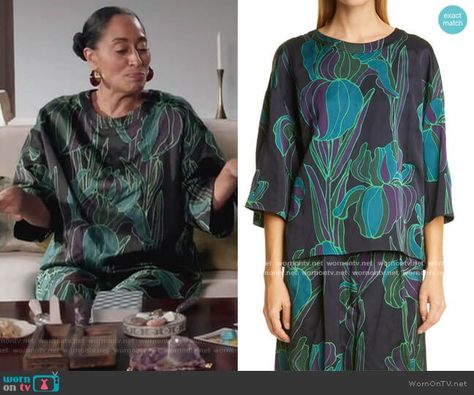 Rainbow’s floral print blouse and pants on Black-ish. Outfit Details: https://wornontv.net/221749/ #Blackish Blackish Rainbow Style, Black Floral Print Tops For Streetwear, Black Crew Neck Top With Rainbow Print, Black Pride Screen Print Top, Black Printed Collared Blouse, Rainbow Pants, Rainbow Top, Rainbow Outfit, Floral Print Blouses