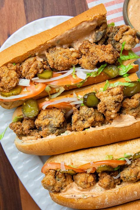 Oyster Po’ Boy Poboy Sandwich Recipe, Pickles Tomatoes, Po Boy Sandwich, Louisiana Hot Sauce, Oyster Recipes, Remoulade Sauce, Fried Oysters, Fresh Oysters, Cajun Cooking