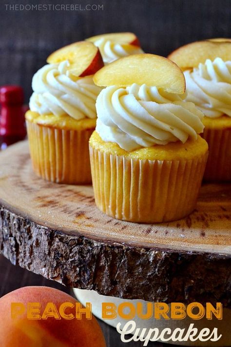 These Peach Bourbon Cupcakes couldn't be easier or more impressive to whip up! Moist and tender peach cupcakes topped with a bourbon-infused real peach buttercream frosting. So great for when peaches are in season and extra ripe! Peach Buttercream, Bourbon Cupcakes, Cupcake Topping, Bourbon Cake, Peach Bourbon, Peach Cupcakes, Infused Cupcakes, Boozy Cupcakes, Boozy Desserts