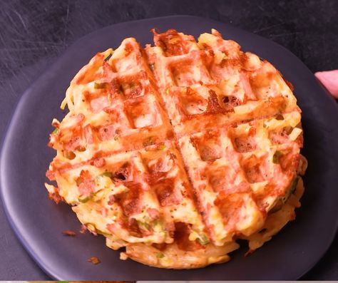 Start your day with a delicious and easy breakfast! This Cheesy Hashbrown Waffles recipe is a simple way to enjoy a savory, crispy waffle packed with melty cheese and shredded potatoes.