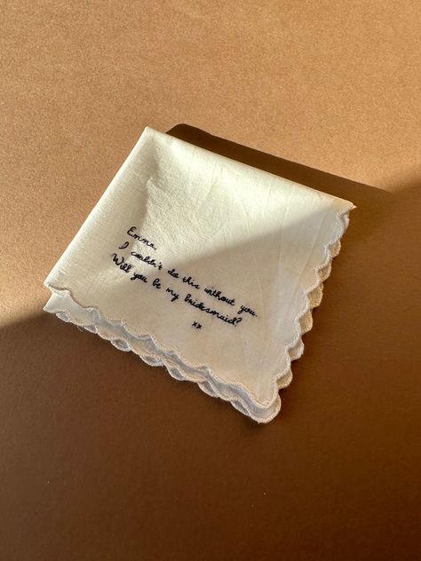 A pure cotton white scallop handkerchief hand embroidered with words of your choice, either in our handwriting font or your own handwriting. A sentimental and beautiful keepsake. If you want to use your own handwriting please send us a picture of your message in the layout you would like once an order has been placed. The embroidery will be in dark blue thread, let us know if would like to choose an alternative colour.  If you need a quicker delivery time or any adjustments please get in touch. Details: * Dimensions - 28cm x 28cm * 100% Cotton * Blue cotton thread * This item can be machine washed Handwritting Gifts, Wedding Embroidery Ideas, Sentimental Embroidery, Handkerchief Aesthetic, Embroidery Words, Embroidery Message, Embroidery Handkerchief, Handkerchief Embroidery, Embroidered Handkerchief Wedding