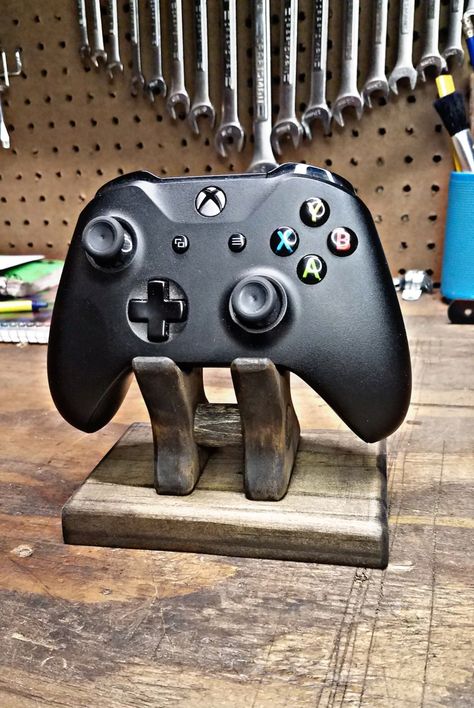 Store your controllers in style with this DIY Controller Stand Diy Controller Stand, Diy Controller, Oscillating Spindle Sander, Gamer Controller, Wipe On Poly, Spindle Sander, Jacobean Stain, Controller Holder, Controller Stand