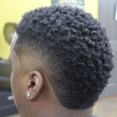 Burst Fade Mohawk Hairstyles for Black Men #burstfade #mohawk #burstfademohawk #blackmenhaircuts #blackmenhairstyles #africanamericanhairstyles #africanamericanhaircuts #newhaircuts #trendinghaircuts #blackmenhair #haircuts #hairstyles Semi Mohawk, Hairstyle For Black Men, Mohawk For Men, Mohawk Hairstyle, Mohawk Haircut, Mohawk Hairstyles Men, Black Hair Cuts, Burst Fade, Hot Haircuts