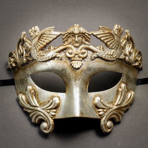 This Greek-Roman Emperor Mask Is Made From Paper Molding And Has An Aged Finish. Decorated With Man And Wing The Mask Is About 6" Tall And 7" Wide. The Masquerade Mask Will Make A Great Costume Accessory. Made From Plastic With Paper Moldings And Hand-Painted. Great For A Masquerade Ball Or Venetian Costume Features Mythological Beasts The Mask Is Approximately 6" Tall And 7" Wide Hand-Painted With An Aged Finish Color: Metallic Silver Usm-M31001-Sv Greek Mythology Mask, Greek Comedy Mask, Mask With Wings, Greek God Party Theme, Neutral Mask, Greek Masks, Mythological Beasts, Greek Chorus, 21st Birthday Themes