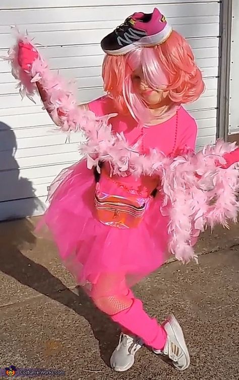 Christina: This is my daughter, Briya. She is bubble gum stuck to the bottom of a shoe. I love this costume because of how versatile it is. It can be fun,... Bubble Gum Halloween Costume, Pink Robe Halloween Costume, Princess Bubble Gum Halloween, Pink Fitted Tutu Dress For Halloween, Pink Halloween Tutu Party Dress, Pink Suspenders, Pink Gloves, Pink Sheets, Homemade Costume