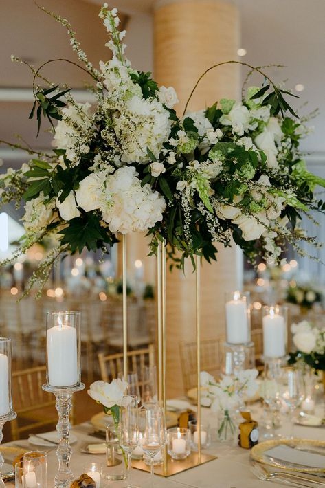 For a glamorous wedding centerpiece, opt for tall floral arrangements in gold stands. We love this for an indoor summer wedding. Click for more beautiful glamorous wedding ideas. // Photo: Alixann Loosle Gold Wedding Flowers, Tall Floral Arrangements, Beach Wedding White, Tall Centerpieces, Wedding Reception Tables, Nautical Wedding, Glamorous Wedding, Deco Floral, Glam Wedding