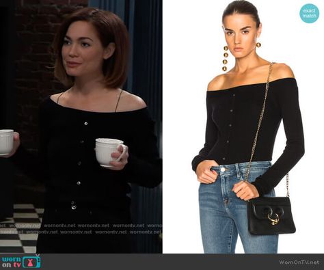 Elizabeth’s black off shoulder cardigan on General Hospital. Outfit Details: https://wornontv.net/280135/ %23GeneralHospital Off The Shoulder Cardigan, Elizabeth Sweater, Elizabeth Webber, Shoulder Cardigan, Hospital Pictures, Hospital Outfit, Black Off Shoulder, Detailed Sweater, General Hospital