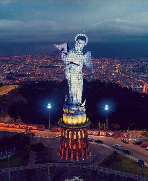 STATUE THE ``WINGED VIRGIN OF QUITO´´ AT PANECILLO HILL. IN THE BACKGROUND A PANORAMIC VIEW OF THE SOUTH OF THE CITY. EVENING Ecuador Travel, Quito Ecuador, Travel Photography Inspiration, Hispanic Heritage Month, Galapagos Islands, Quito, Travel Inspo, America Travel, Most Beautiful Places