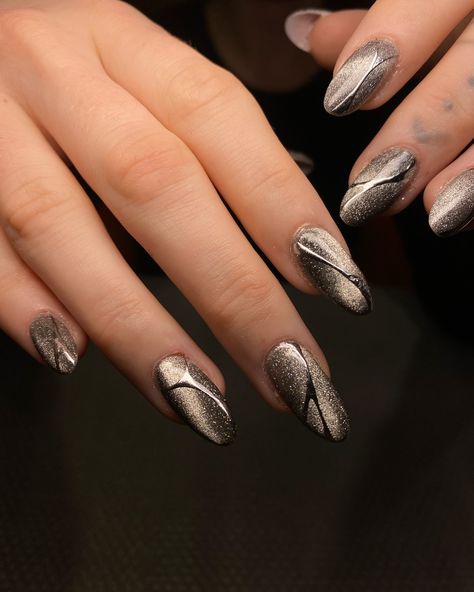 Cat eye and chrome a match made in heaven 🖤 #cateyenails #chromenails #nailtrends #nailtech Chrome And Cat Eye Nails, Cat Eye And Chrome Nails, Chrome Cat Eye Nails, Cat Eye Chrome Nails, Black Cat Eye Nails Design, Silver Cat Eye Nails, White Cat Eye Nails, Cateyes Nails Design, Cateye Nailart