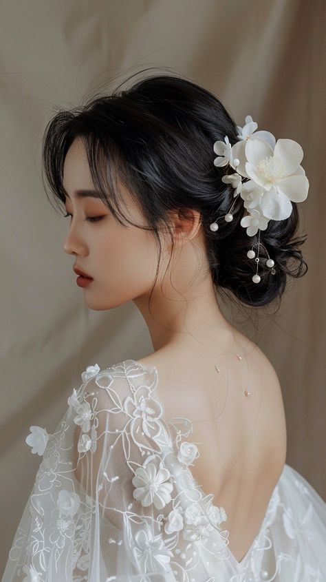 #ElegantBridalBeauty: A stunning #bride in a lace gown captures serenity with delicate #floral #hairaccessories adorning her. #elegance #bridalbeauty #hairstyles #aiart #aiphotography #stockcake ⬇️ Download and 📝 Prompt 👉 https://stockcake.com/i/elegant-bridal-beauty_602540_852878 Wedding Hairstyle Asian Brides, Japanese Bride Modern, Wedding Hairstyles Japanese, Asian Wedding Hair Updo Bridal, Japanese Bridal Hair, Japanese Bride, Intricate Braided Updo, Asian Bridal Hair, Ethereal Bride