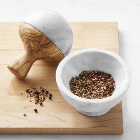 Designed to crush instead of chop, mortars and pestles help maximize the flavor of herbs, seeds and spices. Our exclusive set is expertly handcrafted in Italy using premium marble and sustainably sourced olivewood. Featuring a comfortable handle, the pestle has a half-round shape that promotes quick, efficient grinding. Set includes mortar and pestle. Expertly handcrafted of premium marble and sustainably sourced olivewood. Natural variations in color and pattern of stone and wood make each piec Sweet Kitchen, New Kitchen Gadgets, Mortar Pestle, Platter Set, Dining Table Decor, Mortar And Pestle, Williams Sonoma, Cookbook Recipes, Kitchen Items