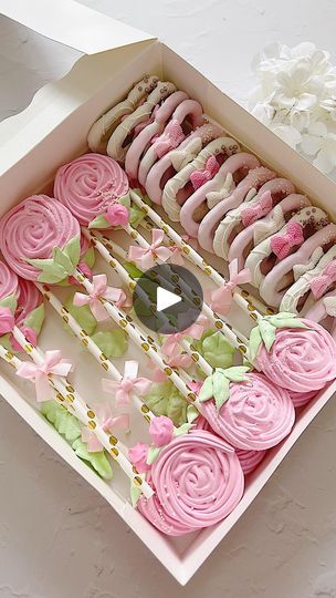 4.3K views · 1K reactions | Meringue flower cookie pops & chocolate covered pretzel.

Pink & white shades of chocolate covered pretzels with pink bows, & meringue flower cookie lollipops.

Have an amazing Tuesday Sweet friends! 
.
.
.
.
#meringuelollipops #meringuecookies #meringueflowers #chocolatecoveredpretzels #chocolatepretzels #treatboxesofinstagram #meringues #swissmeringue #meringuecookie #meringuelollipop #dippedpretzels #pinkasthetics #orlandotreats | Stephanie James | Baby Bash · Suga Suga Cookie Lollipops, Shades Of Chocolate, Lolli And Pops, Chocolate Covered Pretzel, Flower Cookie, Baby Bash, Pretzel Dip, Covered Pretzels, Suga Suga