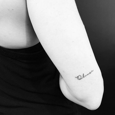 Name On Back Of Arm Tattoo, Olive Name Tattoo, Name Tattoo Back Of Arm, Oliver Tattoo Name, Letter O Tattoo, O Tattoo Letter, Oliver Tattoo, Arm Tattoos Lettering, 27 Tattoo