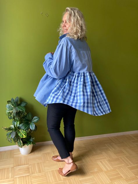 Elevate your wardrobe with this unique upcycled denim blouse, featuring a charming gingham back panel. This one-of-a-kind piece combines comfort, style, and sustainability, making it the perfect addition to any eco-conscious fashion lover's collection. Features: 🧵 Handcrafted: Lovingly upcycled from pre-loved denim shirts, each blouse is transformed into a unique piece with a fresh, modern twist. 👗 Charming Gingham Detail: The back of the blouse features a vibrant gingham pattern, adding a playful and eye-catching element to the classic denim shirt design. 🛋️ Oversized Fit: Designed for a relaxed, comfortable fit, this blouse is perfect for layering or wearing on its own. Its loose silhouette flatters a variety of body types. ♻️ Eco-Friendly: By choosing this upcycled blouse, you're sup Upcycle Clothing, Upcycle Shirt, Denim Shirts, Big Shirt, Gingham Fabric, Upcycled Fashion, Denim Blouse, Upcycled Denim, Eco Friendly Fashion