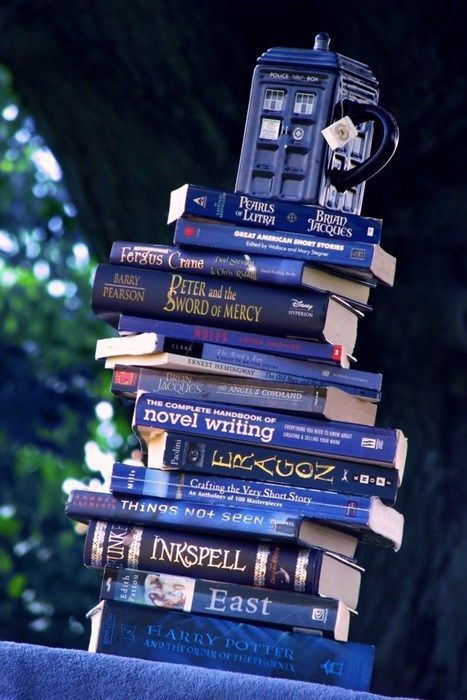 I like this picture for vague and undefined reasons. Maybe it's because I own that mug and a plurality of those books. Can you even use "plurality" in this situation? Whatever. I just did. Anyway. I like it. Books And Tea, Tardis Blue, Rhapsody In Blue, Time Lord, Wibbly Wobbly Timey Wimey Stuff, Timey Wimey Stuff, Blue Books, Feeling Blue, Novel Writing