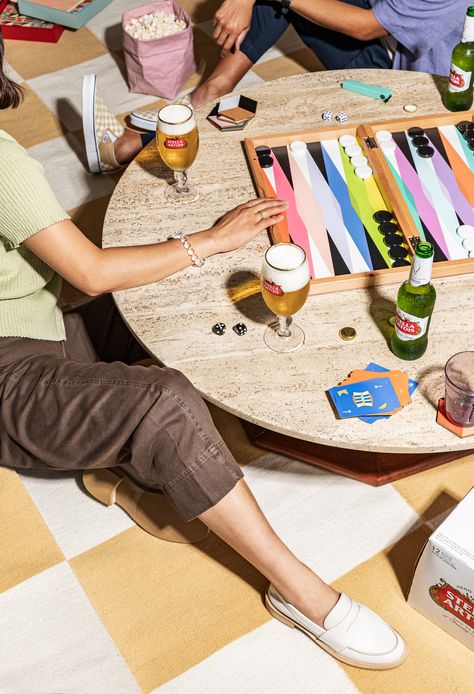 Host a simple and elevated game night at home for you and your friends with a delicious snack spread, Stella Artois, and a few decor essentials. Board Game Space, Game Night At Home, Friend Game Night, Next At Home, Gaming Pillow, Creative Shots, Pizza Games, Hosting Essentials, Board Game Night