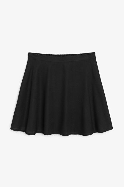 Flowy mini skirt - Black - Mini skirts - Monki GB Flowy Black Skirt, Tennis Skirt Black, Fitted Mini Skirt, Flowy Mini Skirt, Black Pleated Mini Skirt, Skirts Flowy, Satin Mini Skirt, Faux Leather Dress, Black Flare