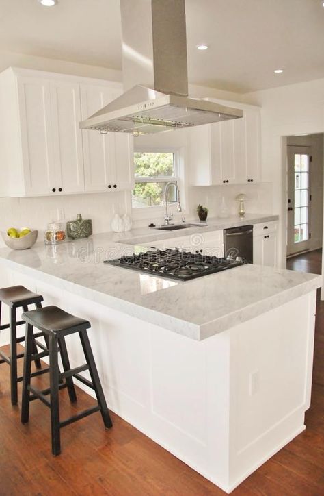 Oven In The Island, Stove Top Island, Carrara Marble Countertops, Peninsula Kitchen Design, Bright White Kitchen, Kitchen Island With Cooktop, Kitchen Stove Top, Island With Stove, Kitchen Island With Stove