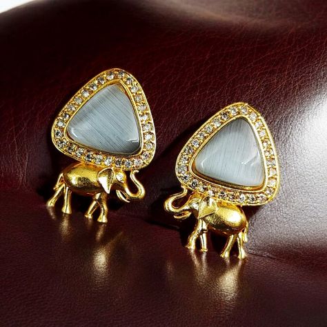 📌 GST Registered Company®️ 📌 Quality Guaranteed 📍PREMIUM STATEMENT PRODUCT! 🧿 🫶 Product Name: Contemporary AD Earrings | Gold-Plated Elephant Design Stud Stone Earrings ❤️ Code= D9C 🧿 For more updates and our unique designs, keep in touch! 👇🙏 📌 Whatsapp Update Link - https://chat.whatsapp.com/LdgD3AZLUzc8PmLhYXCkOw Premium Quality jewellery | Affordable Price | Brass Jewellery | Online Shopping | Earrings | Neckpieces | Finger Rings | Bracelets | Nose Pin | Necklace Set #adorrable #earrin... Shopping Earrings, Ad Earrings, Elephant Motif, Pin Necklace, Brass Jewellery, Nose Pin, Contemporary Earrings, Elephant Design, Rings Bracelets