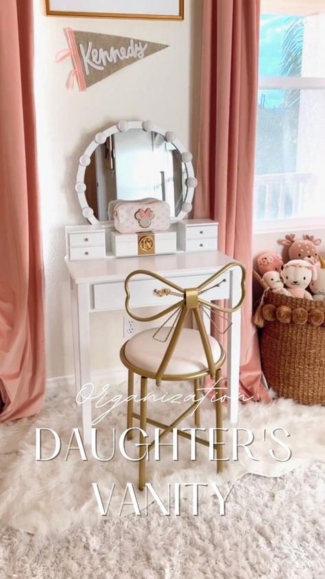 Little girl room with touches of pink and pink drapes. There is a small white vanity and a gold bow chair. Girls Room With Vanity, Kids Vanity Desk, Toddler Makeup Vanity, Kid Vanity Ideas Girl Rooms, Girls Vanity Desk, Vanity For Girls Room, Girls Vanity Ideas, Vanity Girls Room, Girl Vanity Ideas