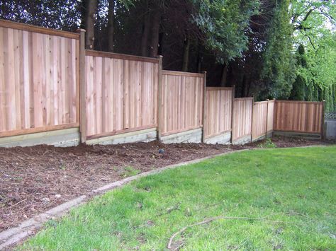 Privacy Fence Building Build a Fence on Sloped Ground Perimeter Fencing, Cheap Garden Fencing, Fence Building, Beach Fence, Backyard Flowers Beds, Sloped Yard, Privacy Fence Designs, Cheap Fence, Backyard Fence