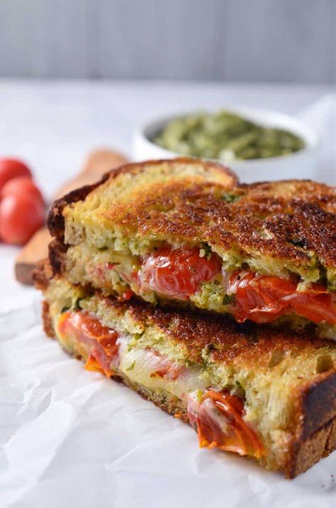 A decadent grilled cheese sandwich made with smoked provolone, roasted tomatoes and sweet pesto. Roasted Tomato Pesto, Provolone Grilled Cheese, Grilled Sandwiches, Grill Sandwich, Panini Recipes, Grilled Cheese Recipes, Tomato Pesto, Steak Sandwich, Grilled Sandwich