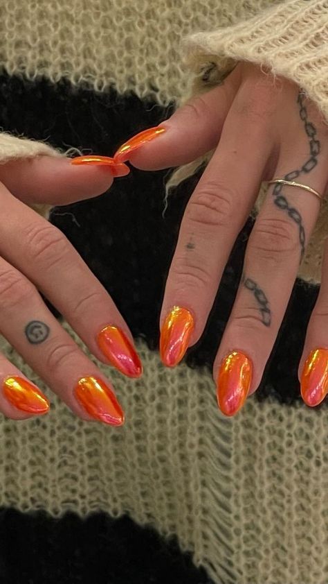 A set of hands showing stiletto-shaped nails painted in a glossy, vibrant orange shade. Orange Nail Ideas, Bold Nail Art, Nail Ideas For Summer, Neon Orange Nails, Orange Nail, Mens Nails, Tropical Nails, Summery Nails, French Acrylic Nails