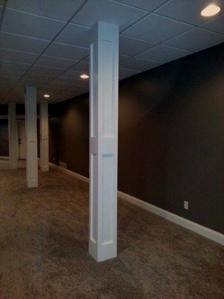 Discover how to hide unsightly support beams and steel posts with the top 50 best basement pole ideas. Explore unique downstair column cover designs. Basement Pole Ideas, Basement Pole Covers, Basement Poles, Small Basement Remodel, Column Covers, Support Beams, Diy Basement, Waterproofing Basement, Basement Makeover