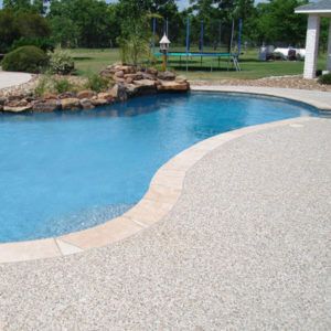 Different Types of Pool Decking | Custom Pool Decking Pool Deck Tile, Decks Around Pools, Swimming Pool Images, Deck Renovation, Pool Decking, Cheap Pool, Swimming Pool Decks, Fiberglass Swimming Pools, Pool Finishes