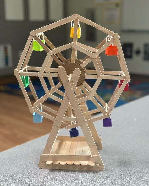 Popsicle stick Ferris wheel design with 4th & 5th graders. Major creative power and problem solving skills at work to design these.… | Instagram Miniature Using Popsicle Sticks, Ferris Wheel Popsicle Sticks, Popsicle Stick Ferris Wheel, Popsicle Stick Ideas, Diy Ferris Wheel, Crafts With Popsicle Sticks, Ferris Wheel Model, Fair Crafts, Popsicle Stick Art